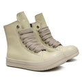 Genuine leather high-top sneakers in black with side zipper and rubber sole.