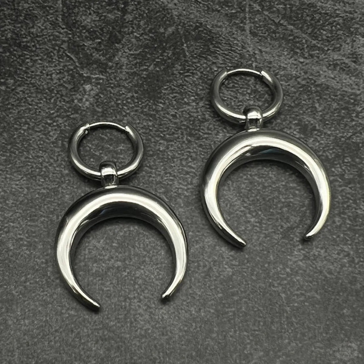 Silver big hoop earrings with vintage gothic moon design and geometric punk style