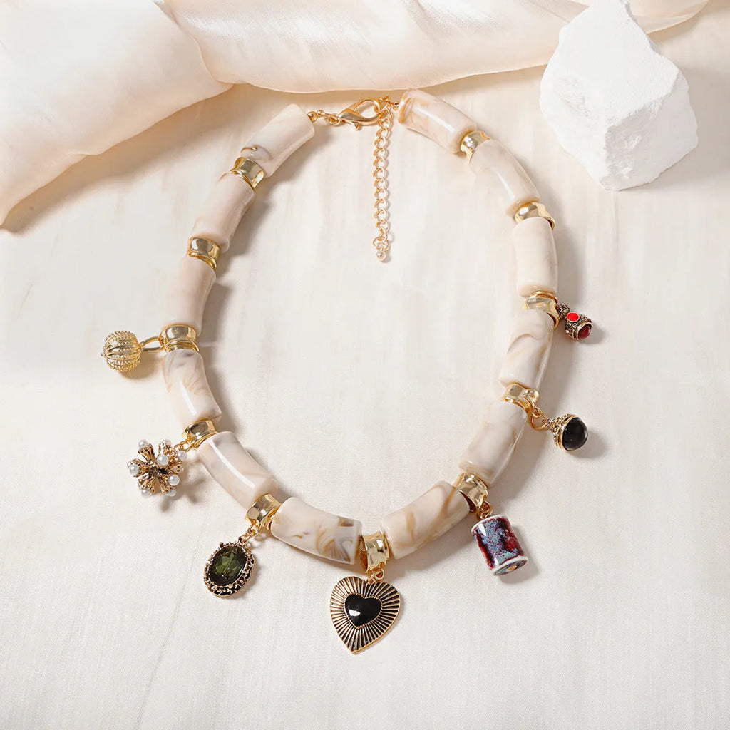 Heart-shaped resin bamboo necklace with electroplated finish on adjustable chain