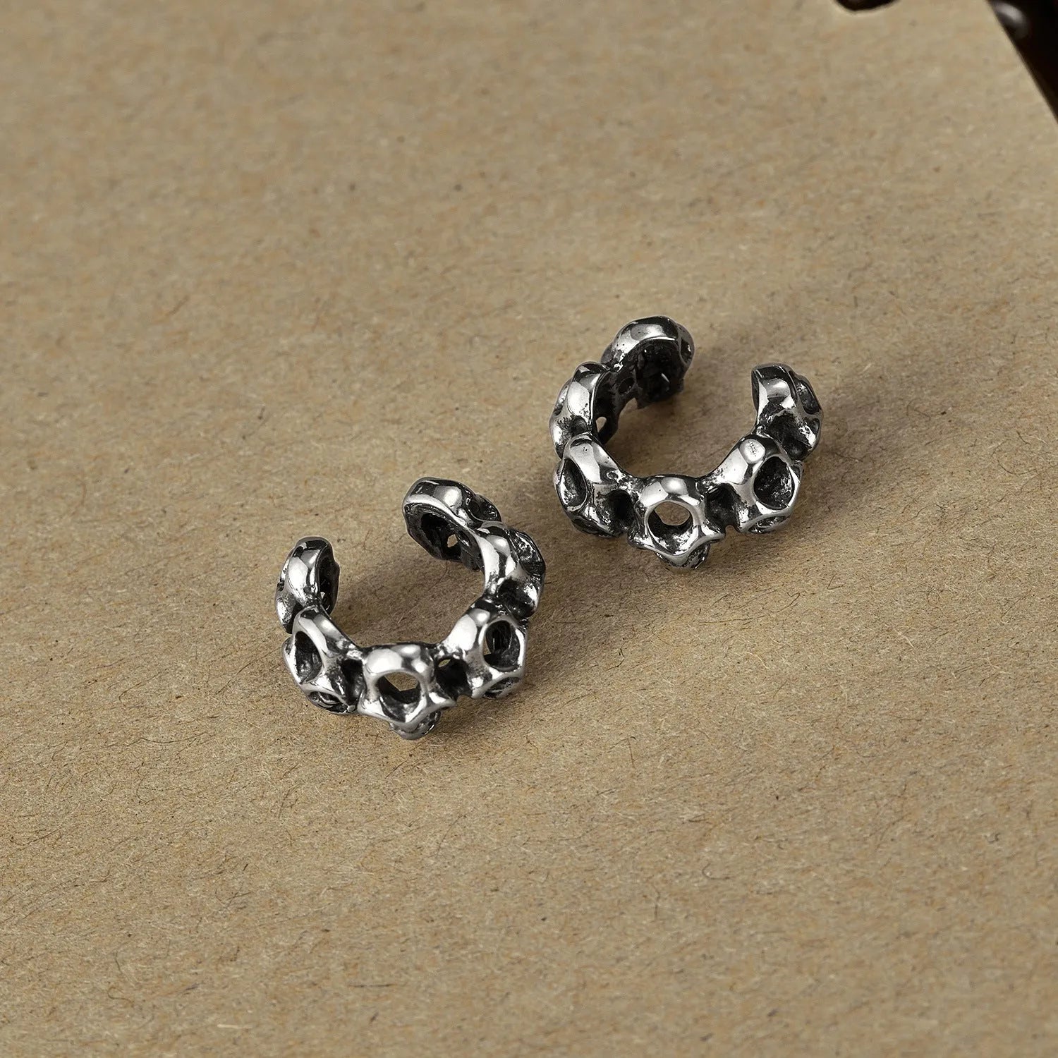 Stainless steel geometric hollow skull earrings with steel clip fittings