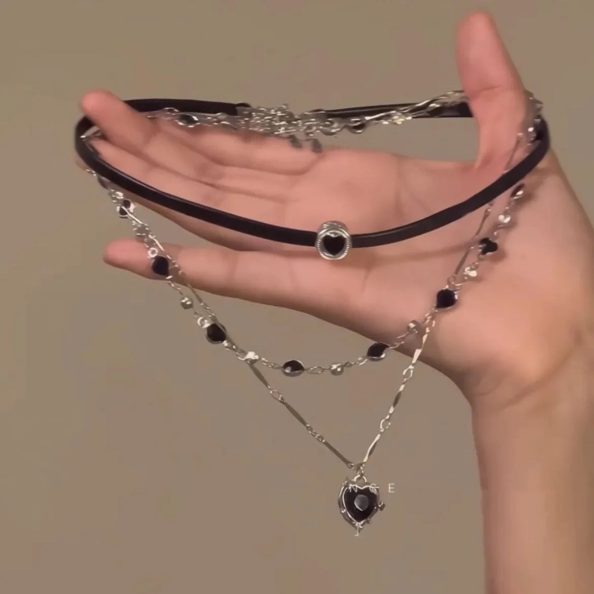 Women's multi-layer necklace with leather heart pendant, alloy chain and artificial crystal elements