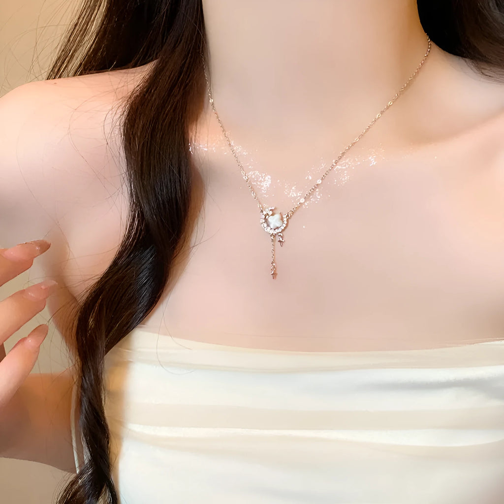 Gold star and moon necklace on adjustable copper chain with diamond treatment