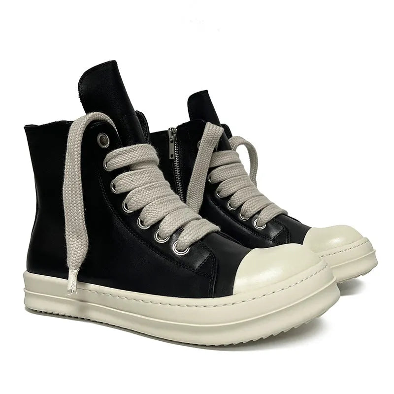 Genuine leather high-top sneakers in black with side zipper and rubber sole.