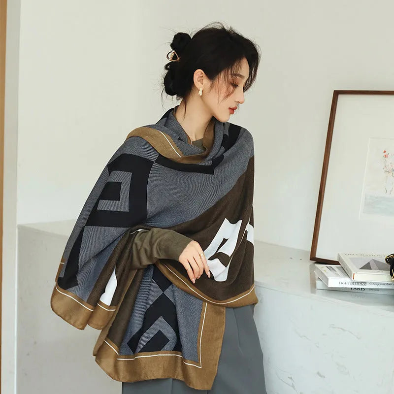 Women's printed polyester scarf showing decorative pattern and mid-length dimensions for autumn wear