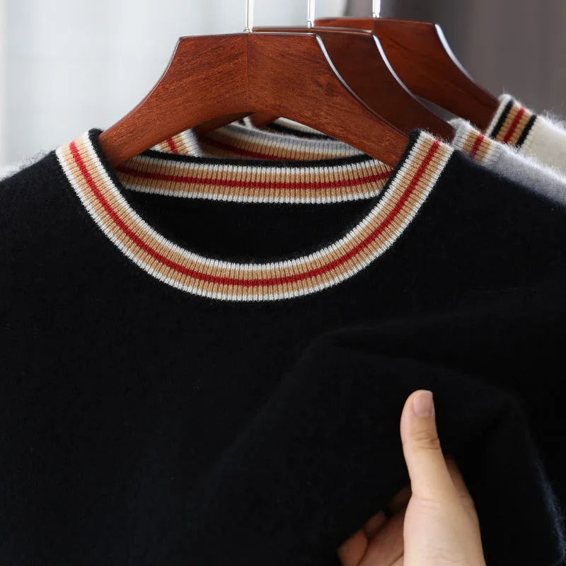 Men's grey round neck short sleeve wool pullover sweater laid flat.