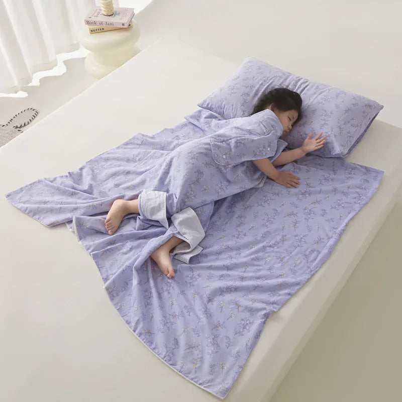 Colourful anti-kick summer quilt with antibacterial filling shown in Magic Puppy print.