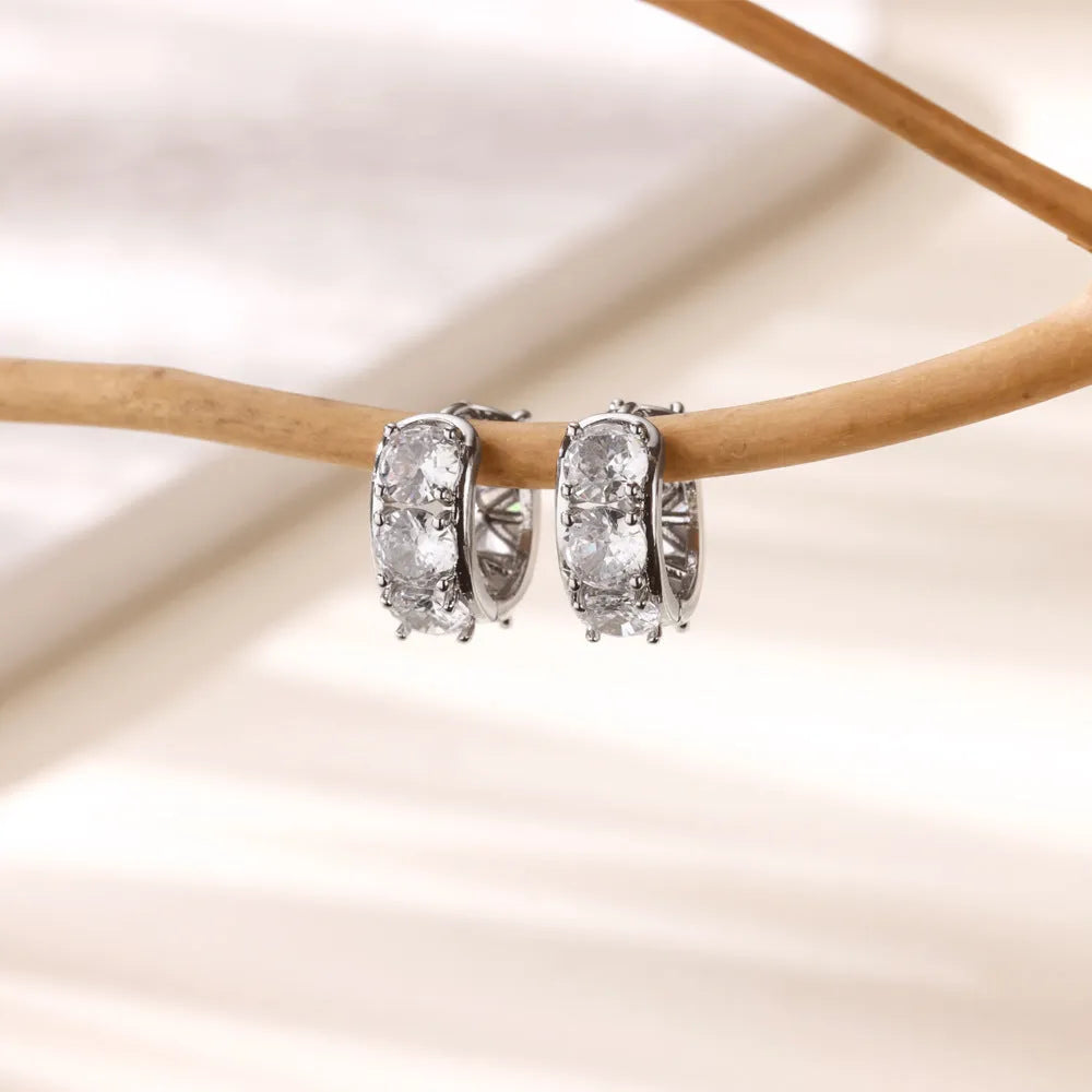 A pair of stainless steel U-shaped ear clip earrings for women with inlaid zircon decoration in colour E5772P.