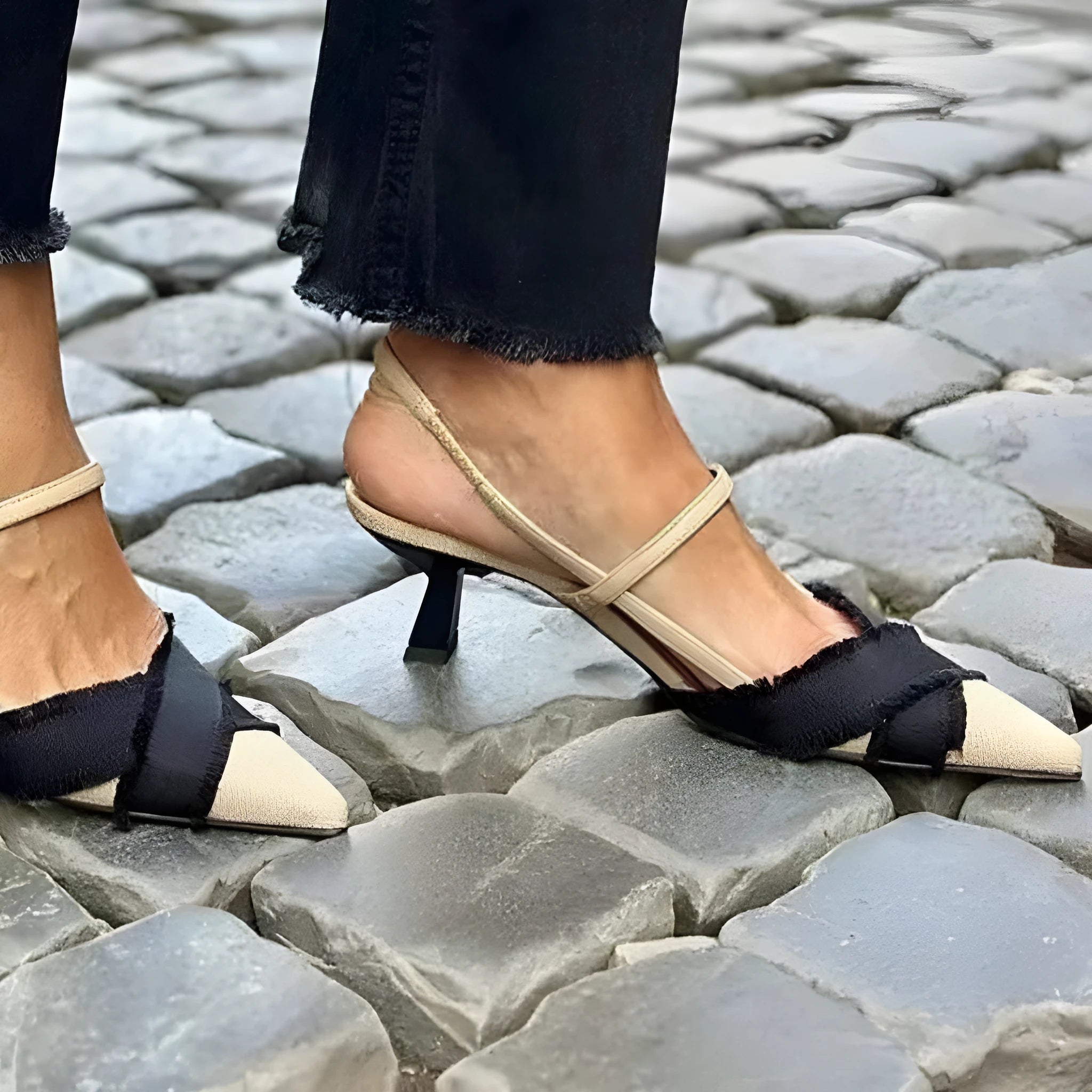 Women's apricot and black colour block stiletto sandals with a pointed toe and buckle fastening.