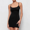 Black sling dress with skinny sheath silhouette and sleeveless design