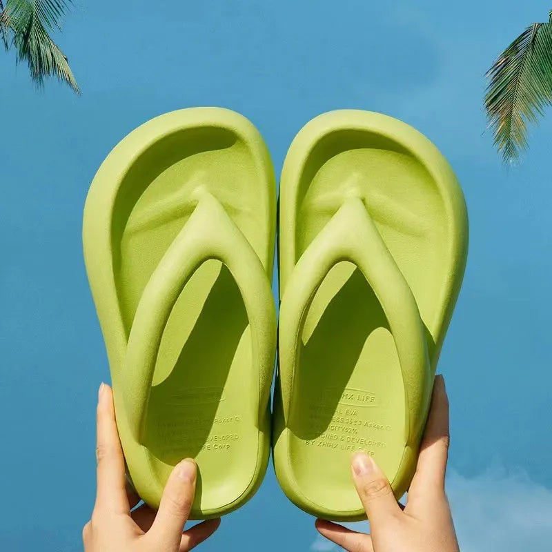 Solid colour EVA flip flops with a thick platform sole and a decorative bow on the strap.