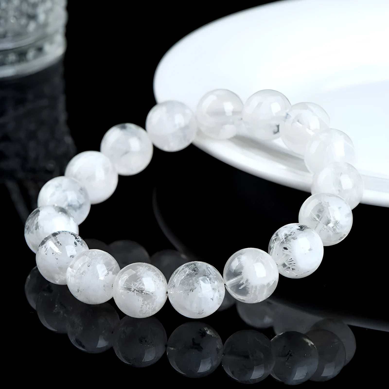 Women's crystal bracelet with natural blizzard snowflake beads featuring Ruyi and Xiangyun Chinese symbols