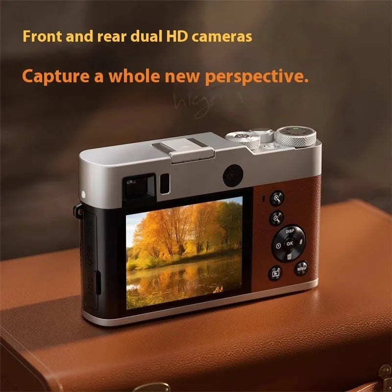 Black 5K digital camera with front and rear lenses, a 2.88-inch screen, and an optical viewfinder on top.