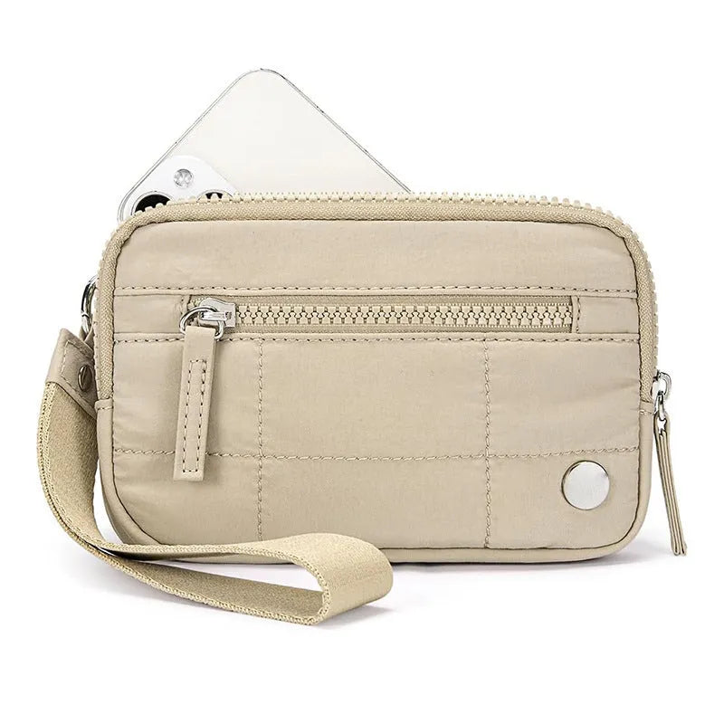 Women's waterproof quilted handbag with transparent deck panel in neutral colour