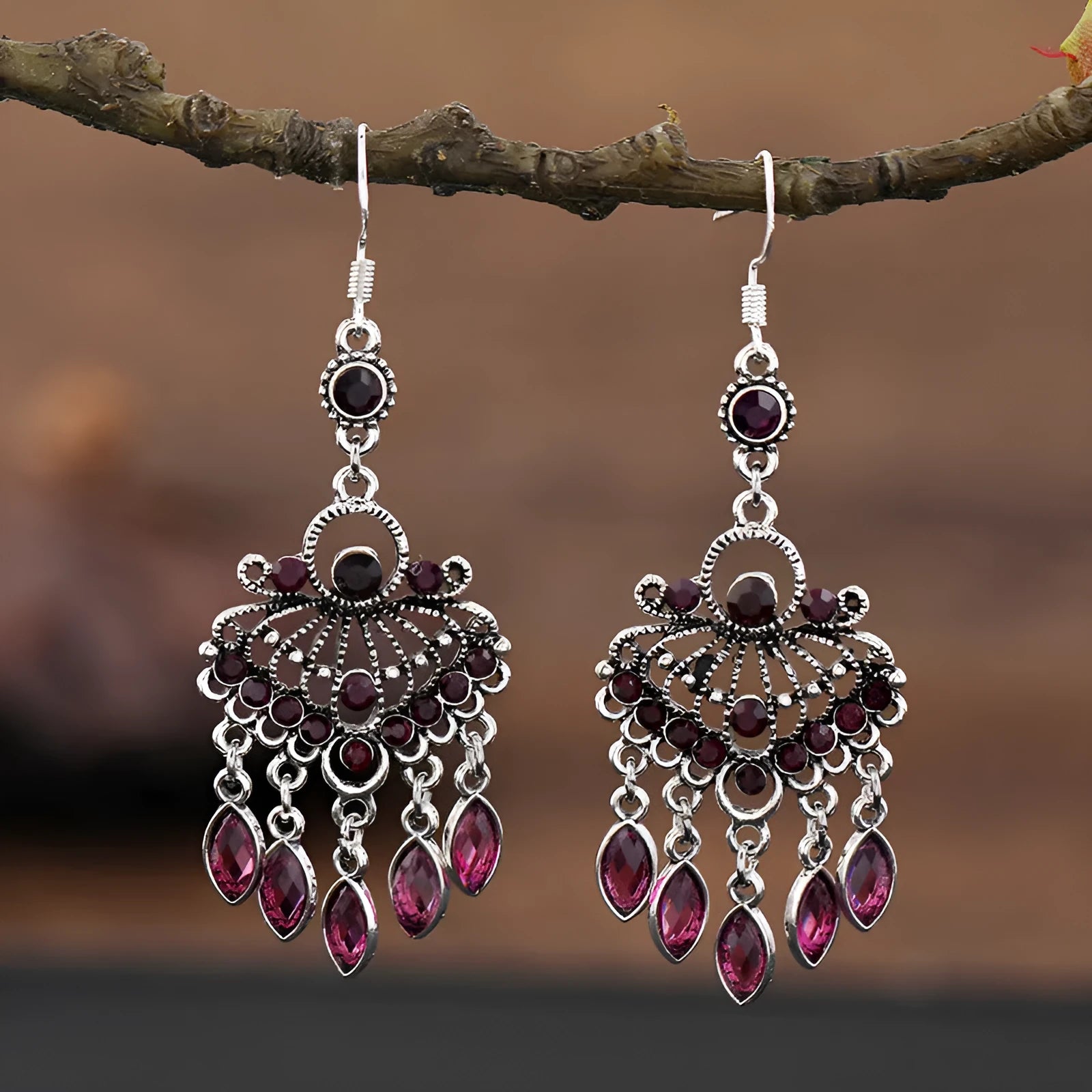 Pair of long purple drop shape fringe earrings with crystals in a retro ethnic style.
