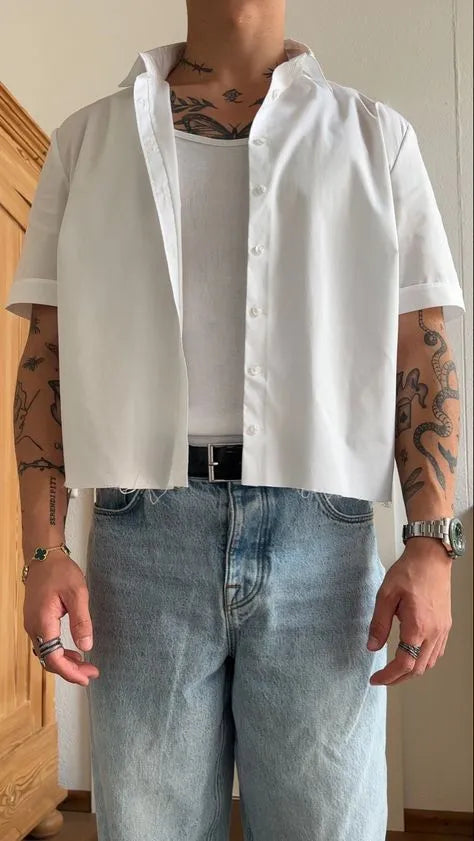 Men's plain white polyester short sleeve shirt with cropped top length on mannequin