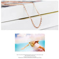 Women's heart-shaped synthetic crystal pendant necklace with rose gold cross chain