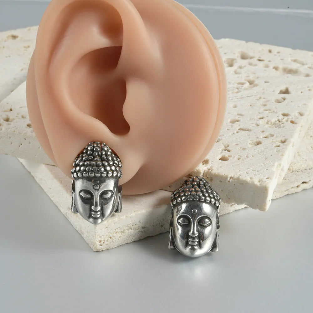 Stainless steel hollow skull Buddha earrings with electroplated colour finishes