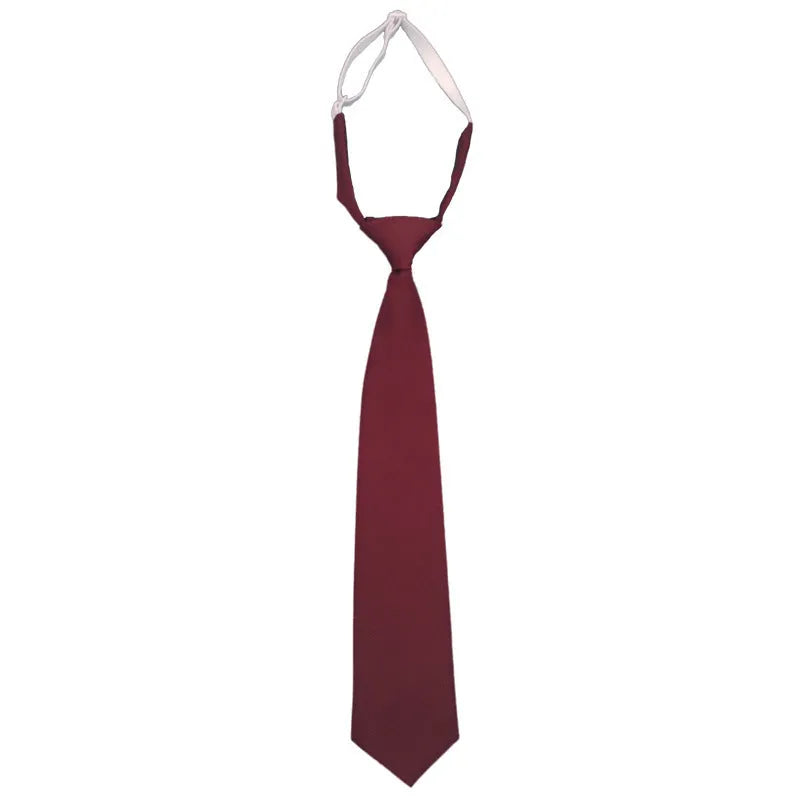 Men's solid colour cotton bow tie in arrow style, shown in navy blue.