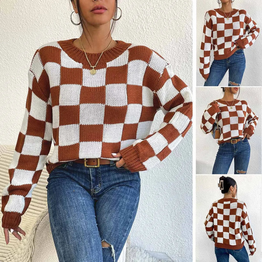 Dark brown loose plaid pullover sweater with long sleeves and a round neck.
