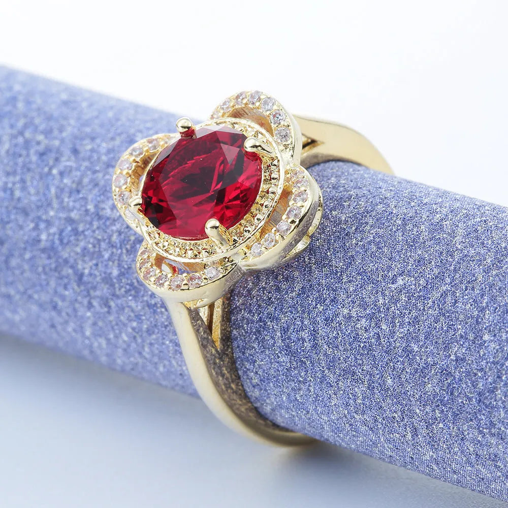 Copper ring with a fruit-shaped zircon stone inlaid, shown in UK size 7, 8, or 9.