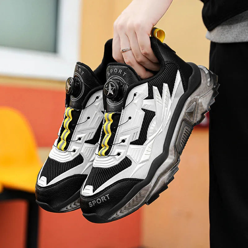 Men's black casual shoes with rotating button closure and platform sole design