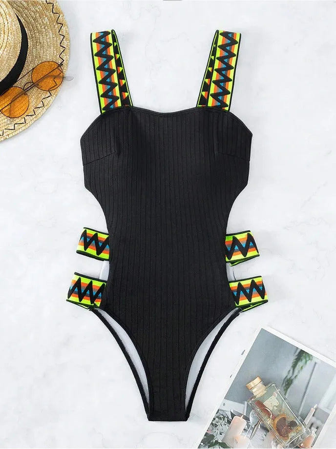 Women's solid colour one-piece swimming suit in black or orange options