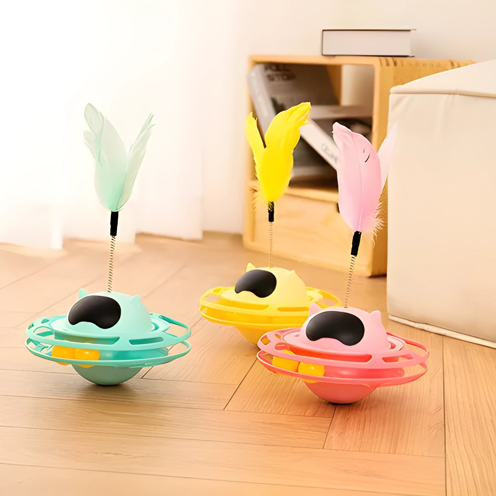 Pink cat stick toy with self-hi tumbler turntable measuring 17 cm by 10 cm