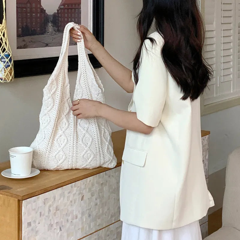 Women's retro crochet knitted woolen yarn shoulder tote bag showing hollow texture and double straps