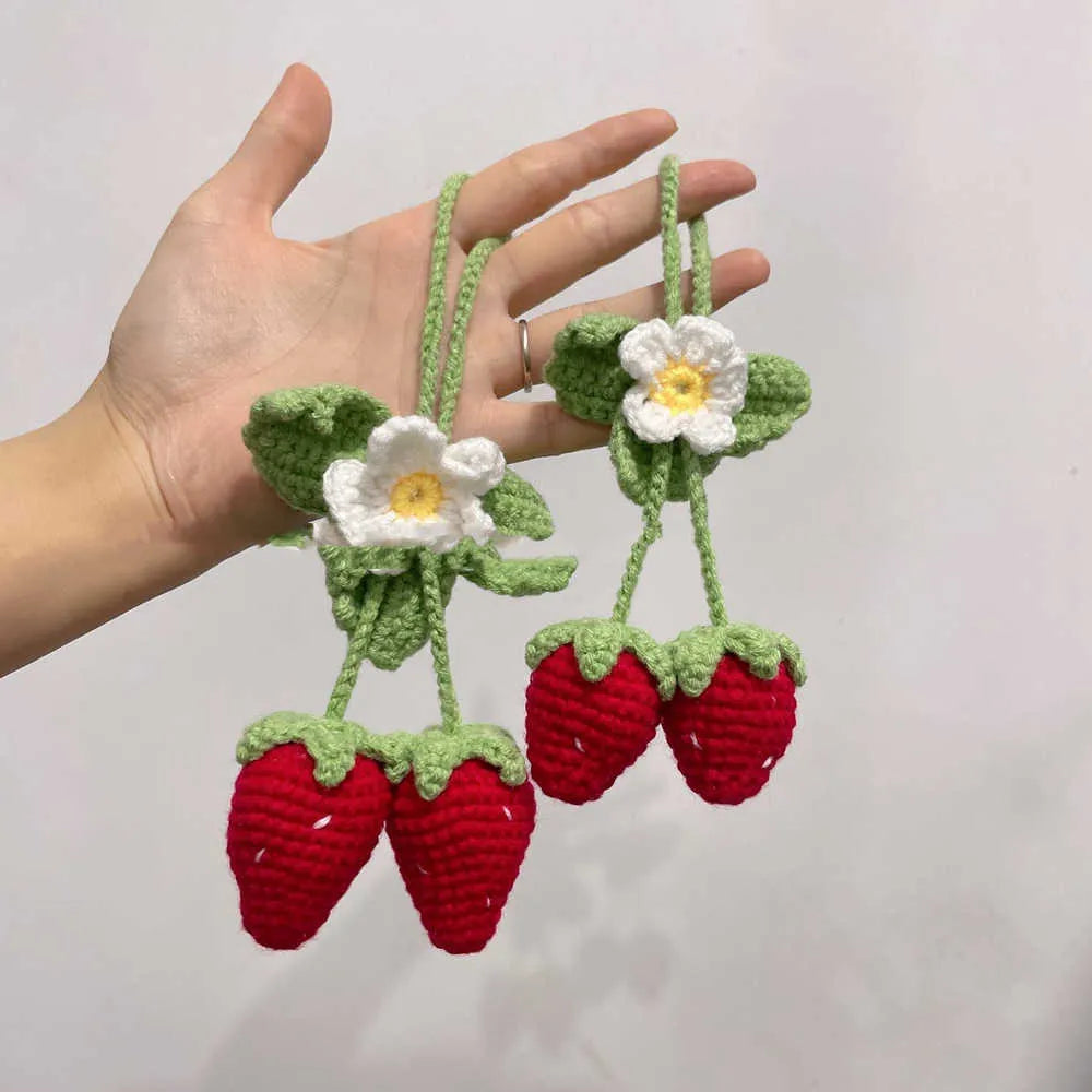Handmade strawberry car pendant decoration with traditional hook knitting using cotton and hemp materials