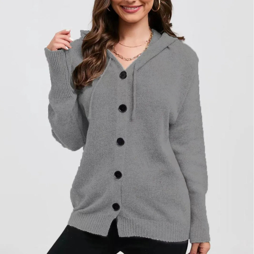 Women's loose hooded cotton sweater in a solid colour with a textured 3D pattern, shown as a cardigan.