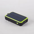Green portable solar power bank with hand crank and 12000mAh capacity