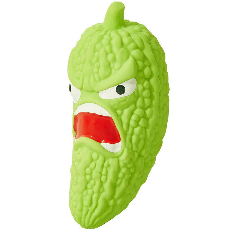 Vegetable-shaped dog chew toy in bitter melon and chili pepper designs with textured surfaces for dental cleaning