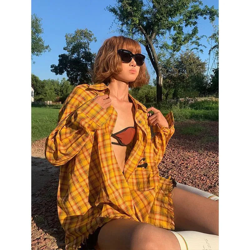 Yellow plaid cardigan shirt with loose fit and polyester blend fabric