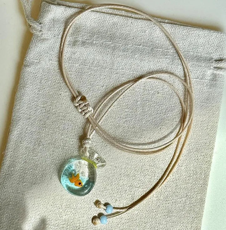 Women's coloured glaze skirt pendant necklace with joker design on cotton linen chain