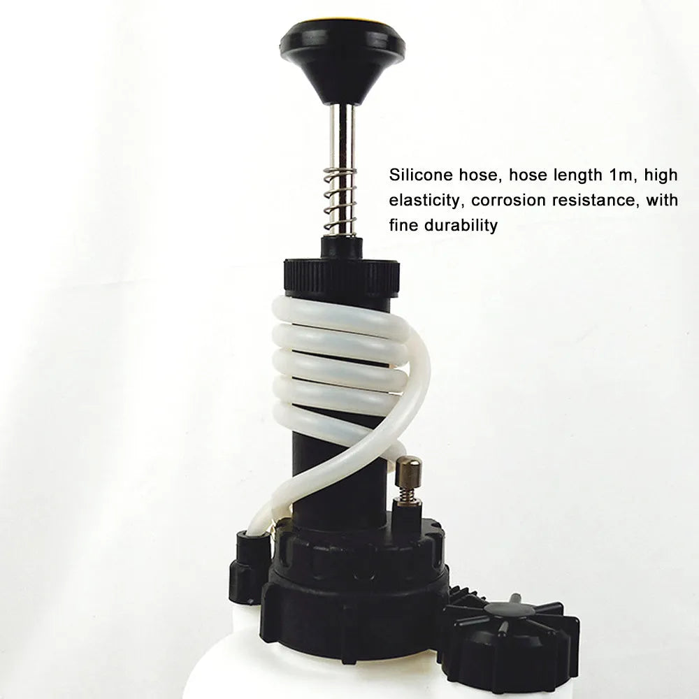 White 3-litre brake fluid bleeder kit with copper fittings and iron pump for car maintenance.