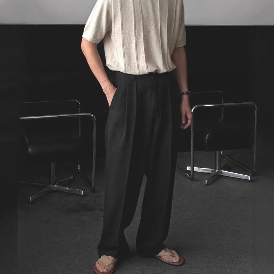 Men's loose lightweight cotton linen trousers in apricot colour showing wide-leg Korean style design