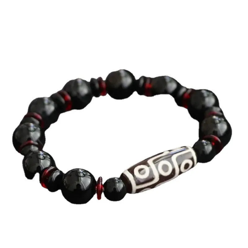 Black agate dzi bead bracelet with 11mm geometry beads and hand-woven construction