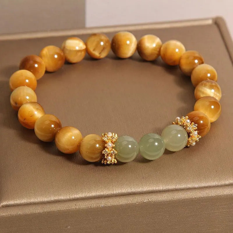 Natural yellow tiger's eye and Hetian jade bracelet with diamond treatment in U-shaped design