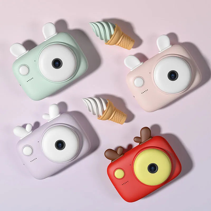 A2 Kids Macaron style digital camera in green colour, showing front and rear lenses and 2.4 inch screen.