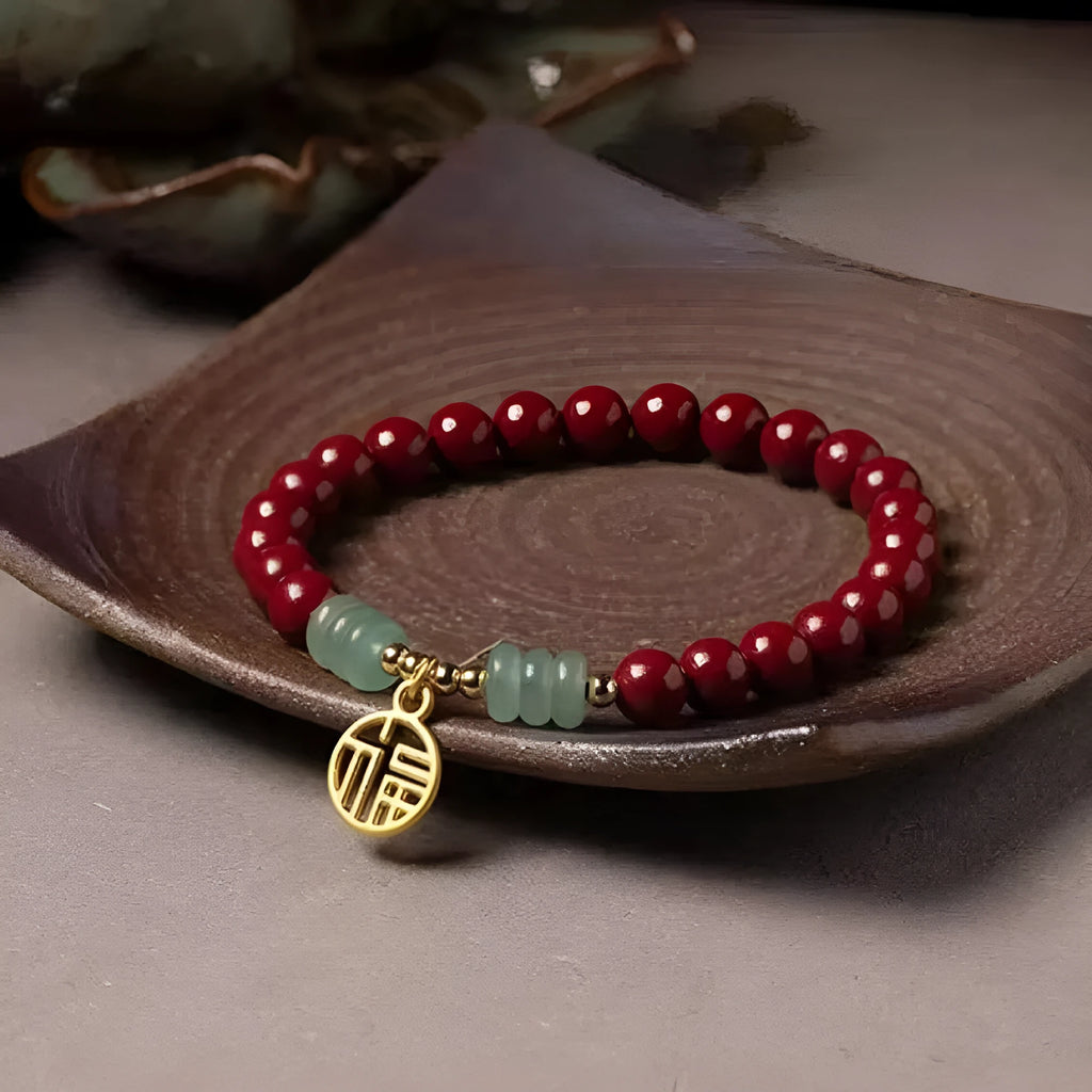 Handcrafted cinnabar bracelet with wave pattern design and copper bead accents in traditional Chinese style