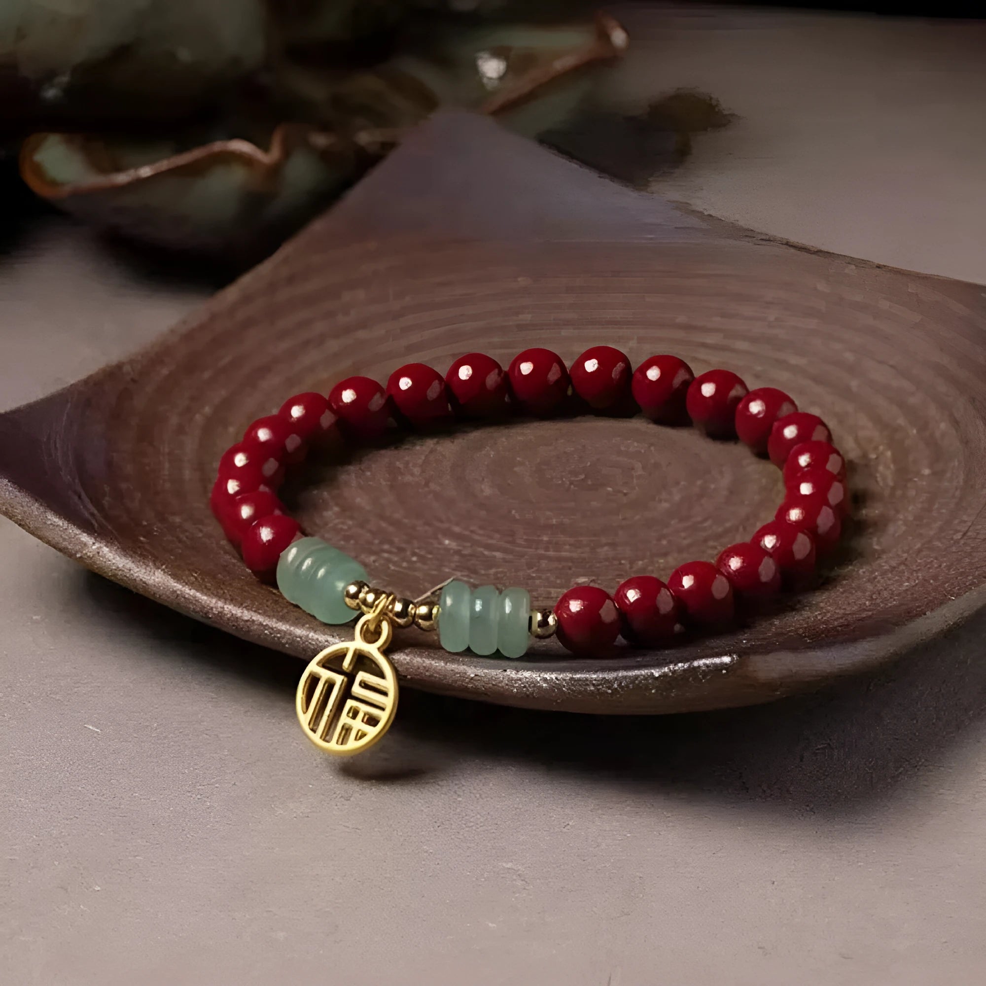 Handcrafted cinnabar bracelet with wave pattern design and copper bead accents in traditional Chinese style