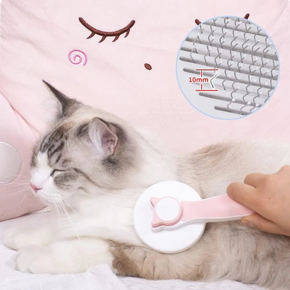 Blue self-cleaning cat and dog grooming brush with rubber handle and metal pins.