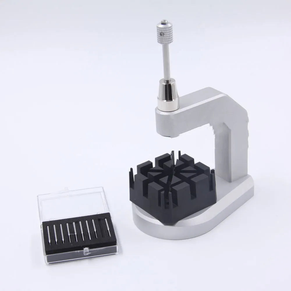 Silver multi-purpose press strap removal tool made of tool steel for watch and jewellery repair.