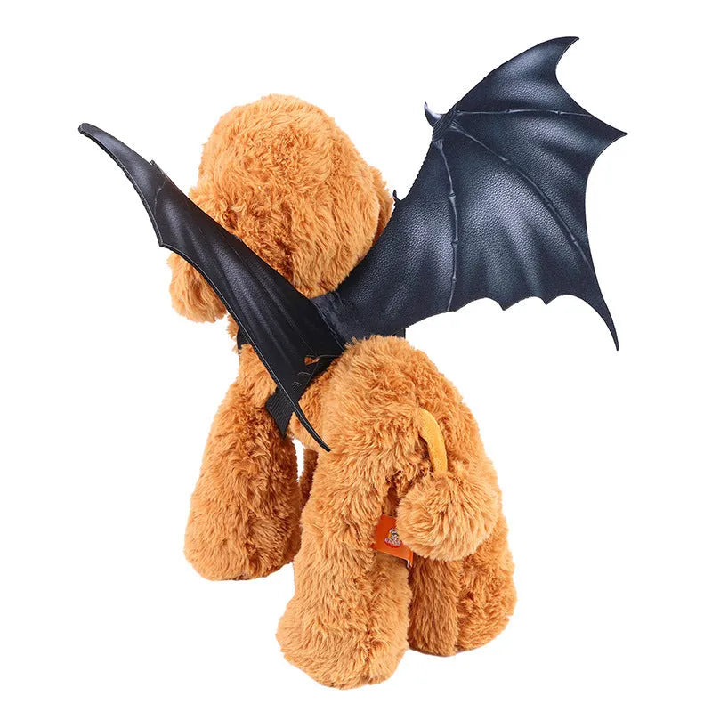 Black cloth bat wing costume for dog or cat, shown in large, medium, and small sizes.