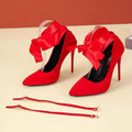 Women's black pointed toe pumps with shallow mouth design and fabric strap fastening