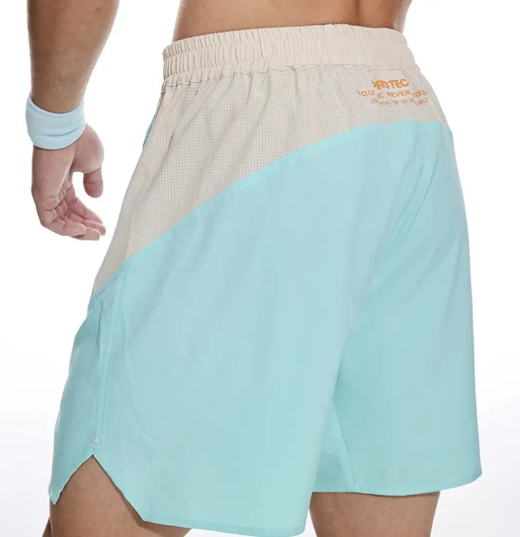 Men's loose hipp lifting workout shorts in dark rock ash colour with elastic waist