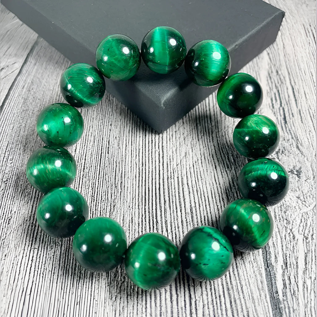 Green tiger eye stone bracelet with geometric beads in polished finish