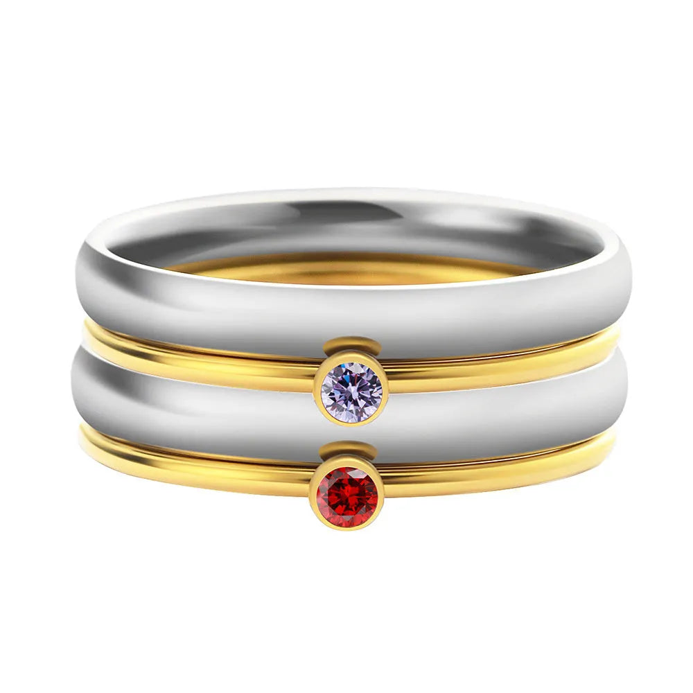 December colour birthstone titanium steel ring with geometric shape and superimposed engraving on band.