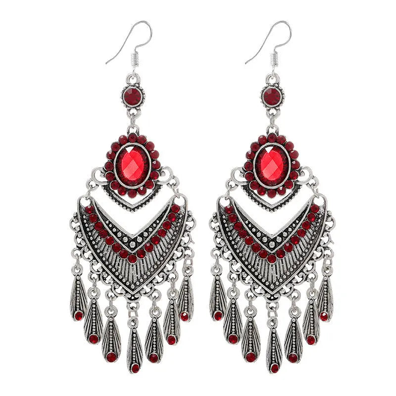 Pair of long purple drop shape fringe earrings with crystals in a retro ethnic style.