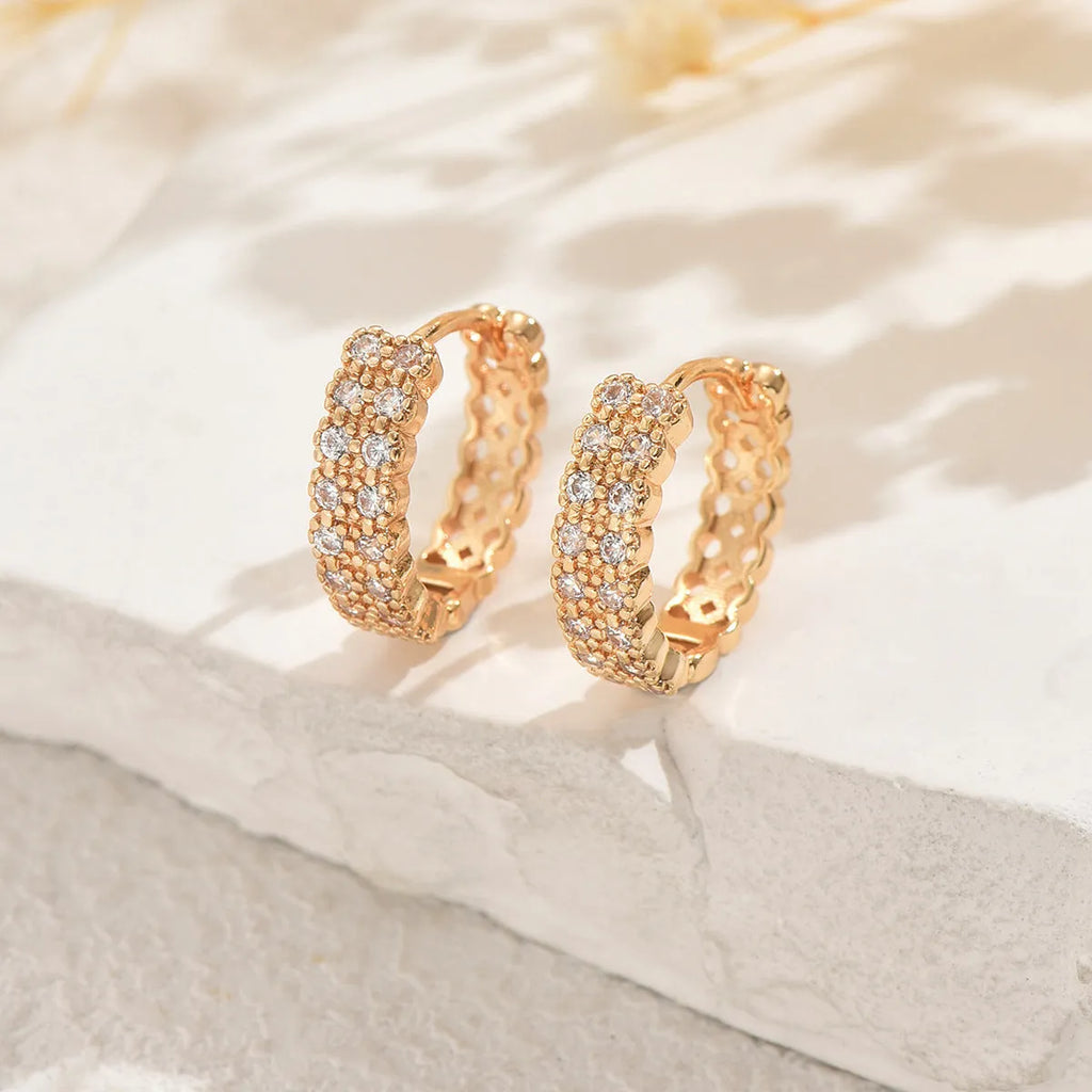 Copper geometry pattern ear studs with round, dot and ring elements in colour DE20288
